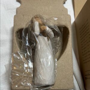 Elegant Figurine in White